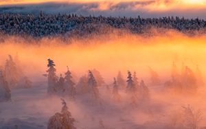 Sunset in snowy Czech mountains