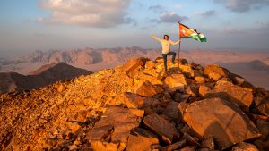 Hiker at Jabal Umm ad Dami at sunset