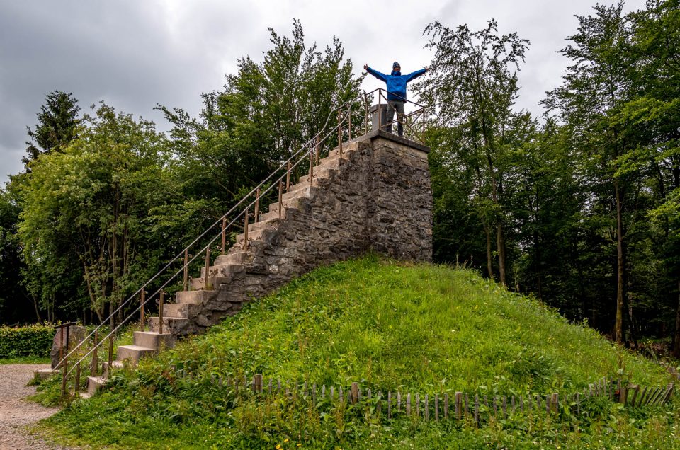 A hiker at the highest point of Belgium Signal de Botrange