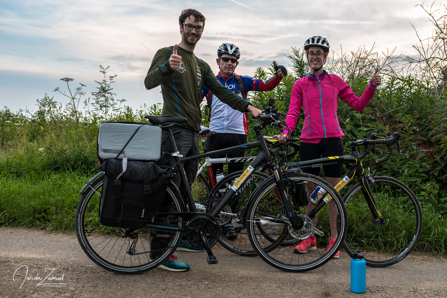 Three bikers at the highest point of Luxembourg - Kneiff