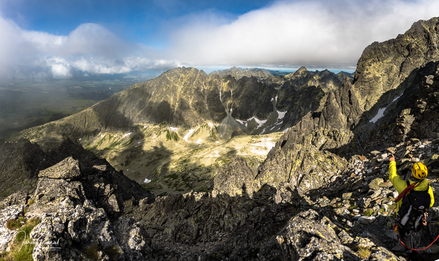 Guide showing the High Tatras after reaching the ridge on the way to Gerlachovský Štít