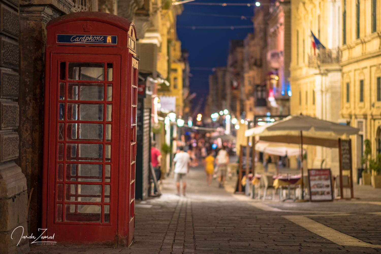 Telephone booth in Valletta at night