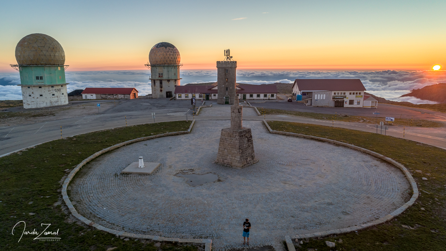 Sunset above the clouds on mountain Torre