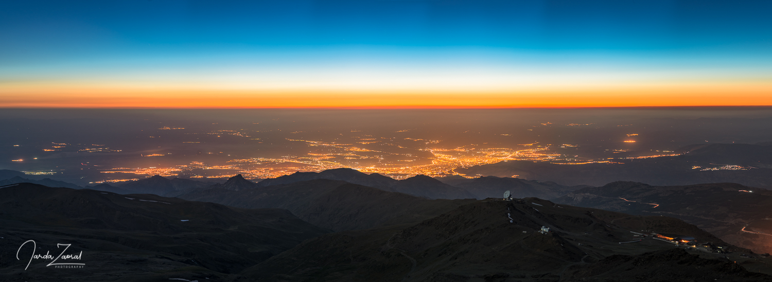 View at city of Granada from the mountains during blue hour