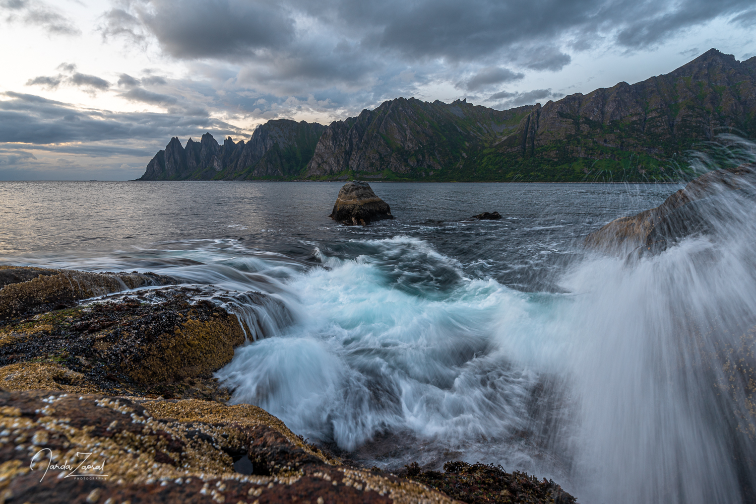 Splashin water from a big wave in an Norwegian fjord