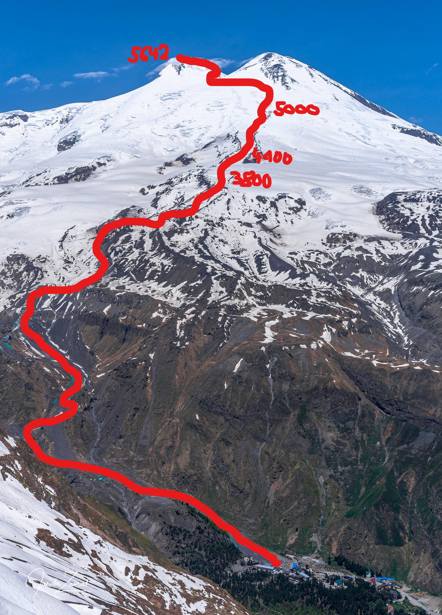 A photo with a description of climb to Elbrus