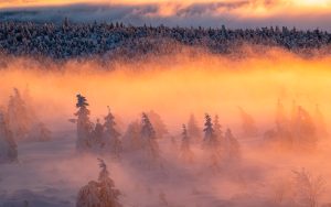 Sunset in snowy Czech mountains