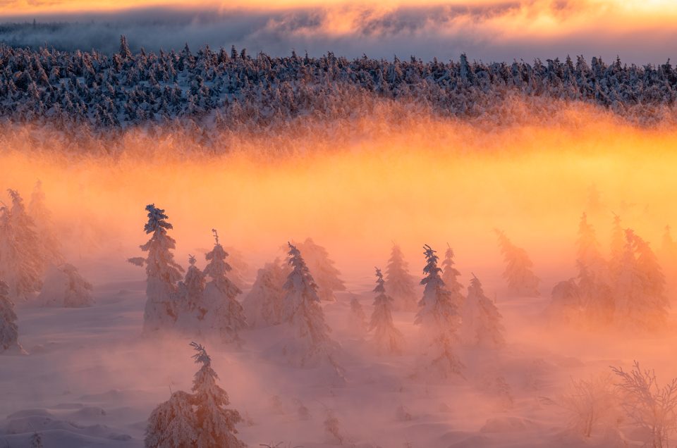 Sunset in snowy Czech mountains