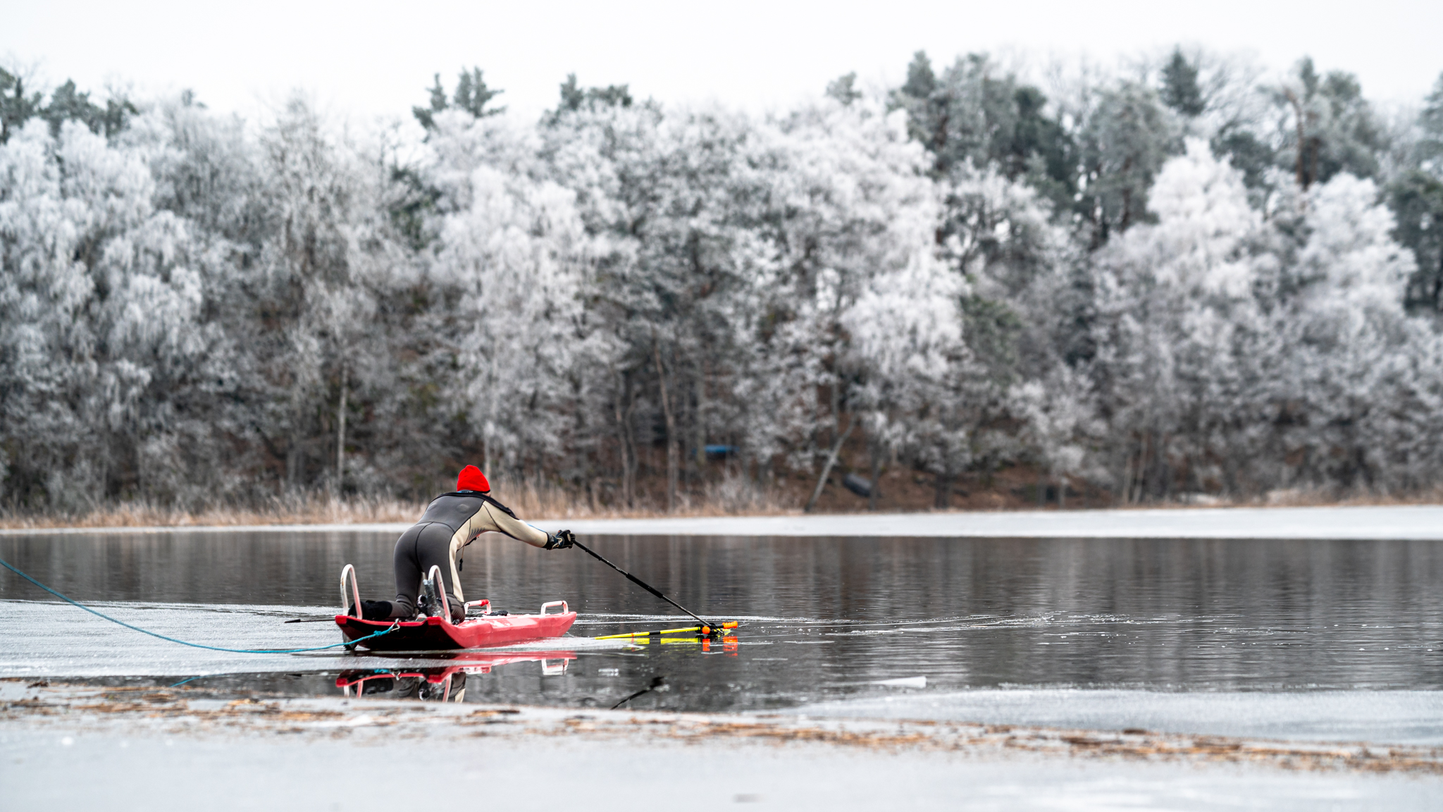 Safety boat saving poles on ice