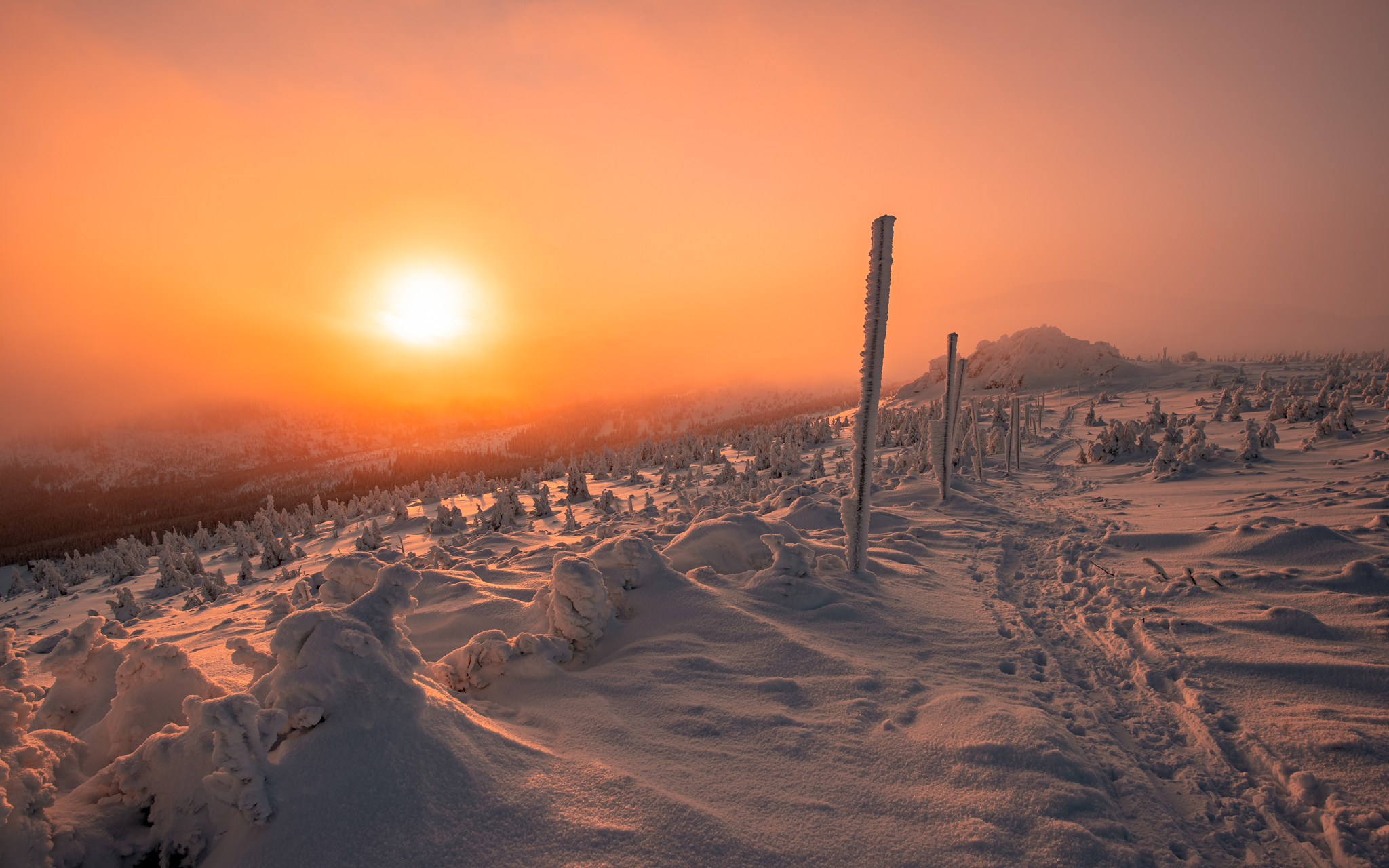 Sunset at Krkonoše in winter after snow storm