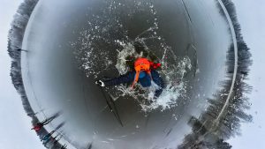 Skater breaks through ice