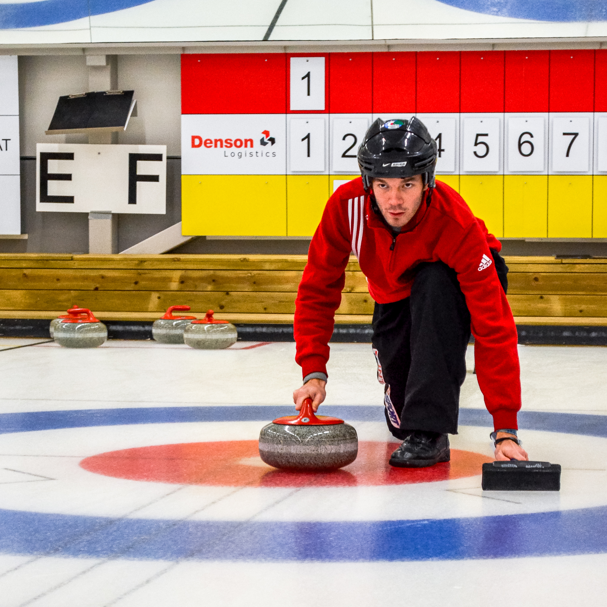 Deep focus before next move at curling