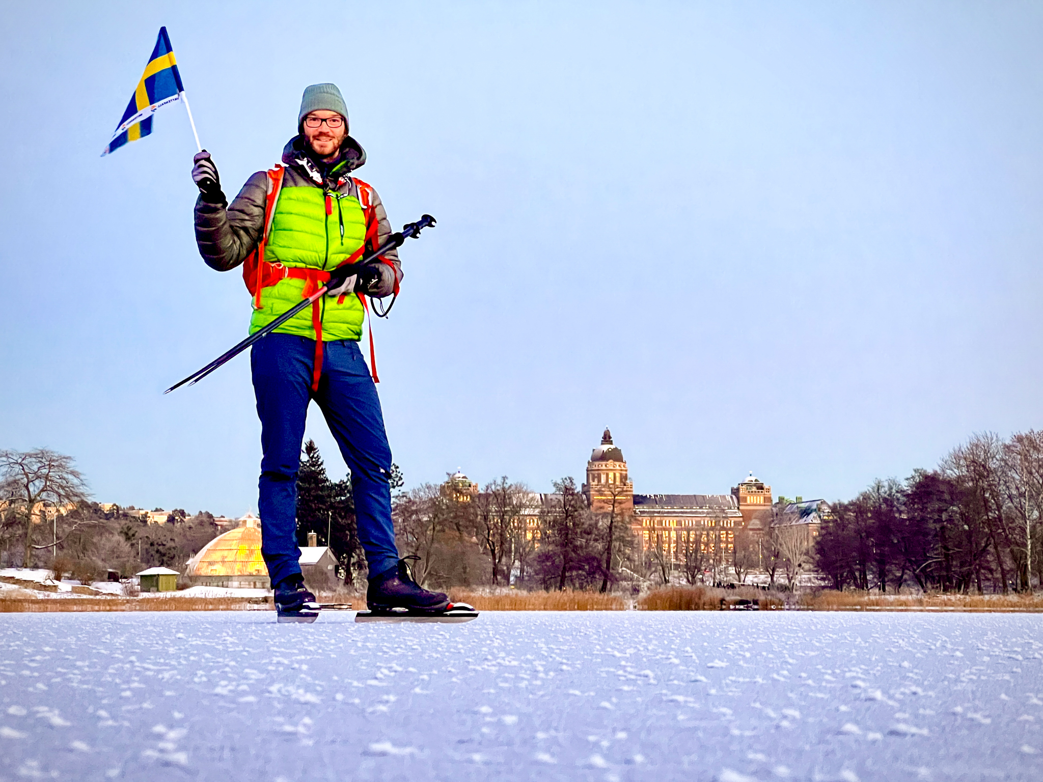 Skating on Brunnsviken with Swedish flag