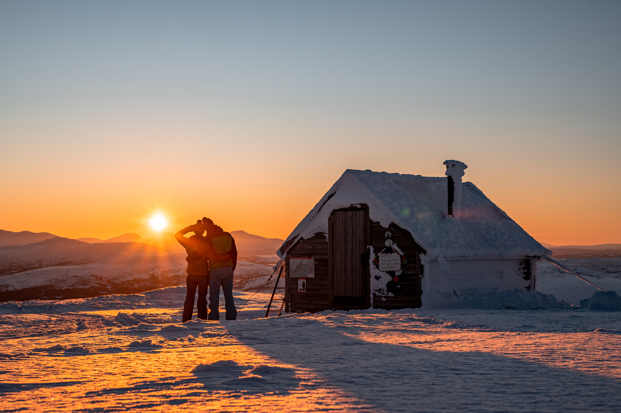 Sunset seen from the small hut at Välliste top nearby Åre, Sweden