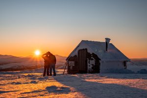 Sunset in mountains around Åre next to a mountain hut