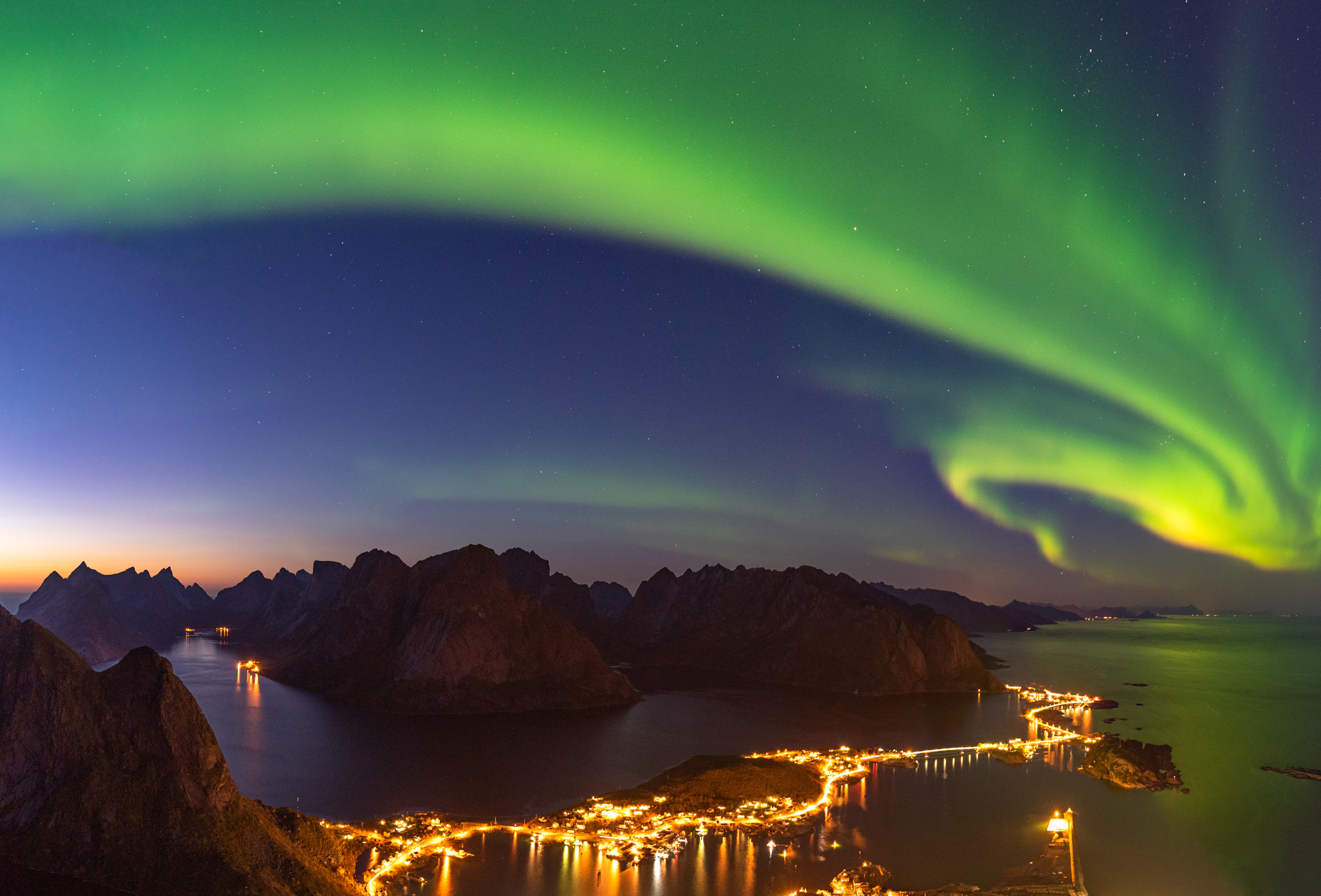 Northern lights above Reinebringen at Lofoten islands