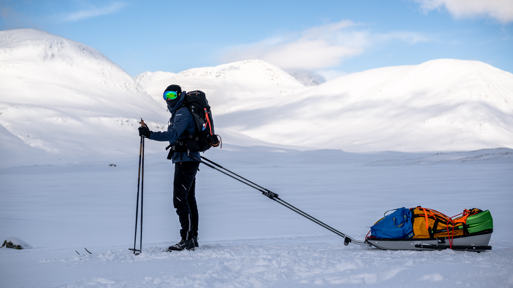 Skier and his sledge on Kungsleden in winter