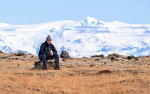 Hiker in front of the highest mountain of Iceland